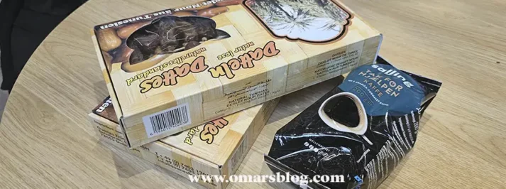 علب تمر تونسي بعد شرائها من بيلكا في الدنمارك